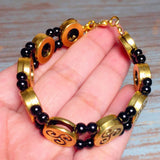 Celtic Triskelion Bracelet Antiqued Gold Black