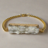 Warm Aurelia bracelet with ivory druzy agate and 18K gold steel chain, softly shimmering with refined texture