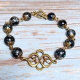 Bronze Knot Gray Glass Bracelet