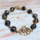 Bronze Knot Gray Glass Bracelet